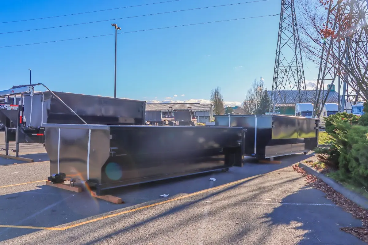 Roll-off dumpster ready for waste disposal at job site for 4 Yard Dumpster Rental in Brunswick